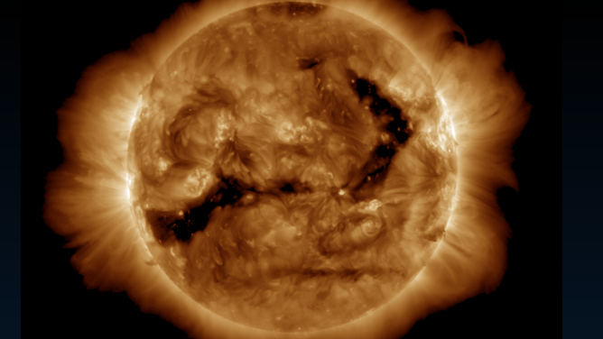 A GOES-16 SUVI image taken on Feb. 9, 2025 showing two coronal holes in the Sun.