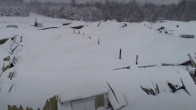 A screenshoot of drone video at a wire plant in Williamstown, New York after the roof collapsed from snow.