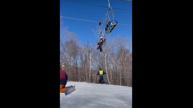 An 8-year-old boy seen dangling from a chair lift in Vermont on Feb. 19, 2025.