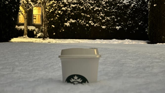 The snow covered about 3/4 of a grande Starbucks cup outside of the Seattle metro area on Feb. 6, 2025.