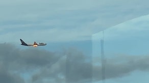 Watch: FedEx jet engine burst into flames after bird strike over Newark