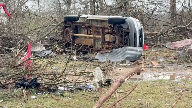 A car lays on its side after being blown over by a tornado in Elliot, Mississippi, on March 15, 2025.