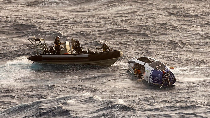 A Lithuanian solo rower has been rescued from the treacherous waters of the Coral Sea after being caught in the path of Tropical Cyclone Alfred. 