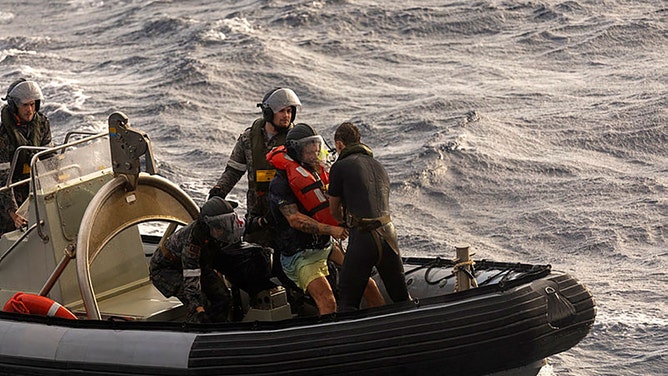 A Lithuanian solo rower has been rescued from the treacherous waters of the Coral Sea after being caught in the path of Tropical Cyclone Alfred.
