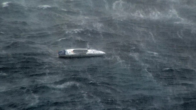 A Lithuanian solo rower has been rescued from the treacherous waters of the Coral Sea after being caught in the path of Tropical Cyclone Alfred.