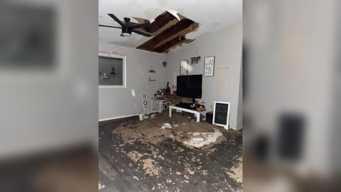 Ashlyn Carter-Lawson's home was damaged when a tornado caused the ceiling to collapse.