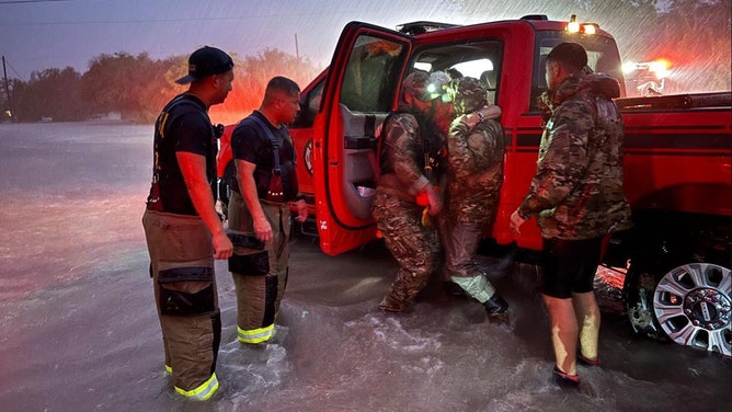 U.S. Border Patrol agents worked through the night Thursday in the Rio Grande Valley, rescuing residents affected by the storms' impacts.
