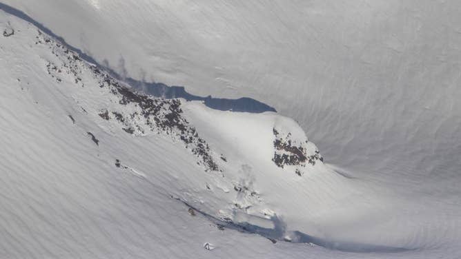 Mount Spurr's crater peak, where eruptions occurred in the 1950s and 1990s. Photo from March 11, 2025 shows steam emitting from the portions of the crater.