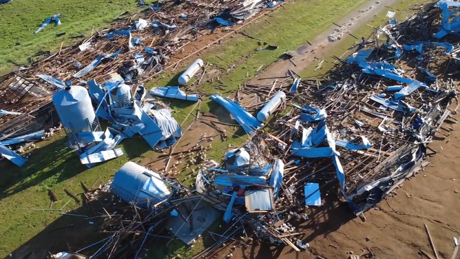 Debris and farm life scattered across the area after a tornado ripped through the small town.