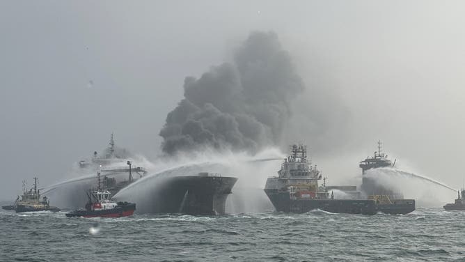 AT SEA, UNITED KINGDOM - MARCH 10: Fire and rescue services attend after a collision between oil tanker MV Stena Immaculate and the cargo vessel MV Solong off the coast of the Humber Estuary on March 10, 2025 at sea, United Kingdom.