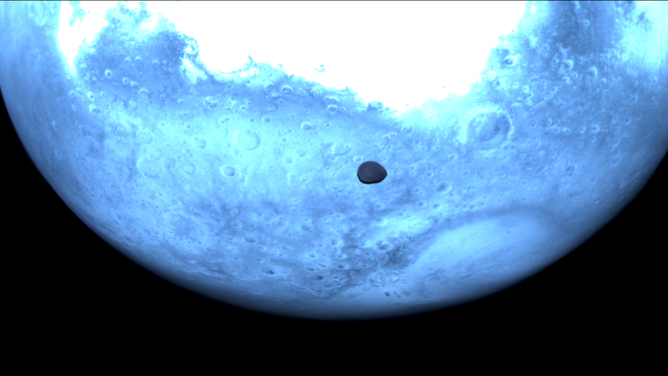 Mars and Deimos viewed by Hera's hyperscout. 