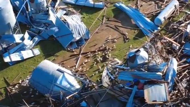 Debris and farm life scattered across the area after a tornado ripped through the small town.