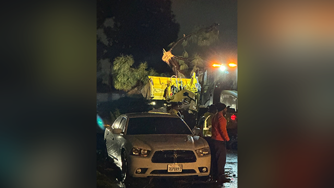 This image shows crews clearing debris after a possible tornado in Pico Rivera, California, on Wednesday, March 13.