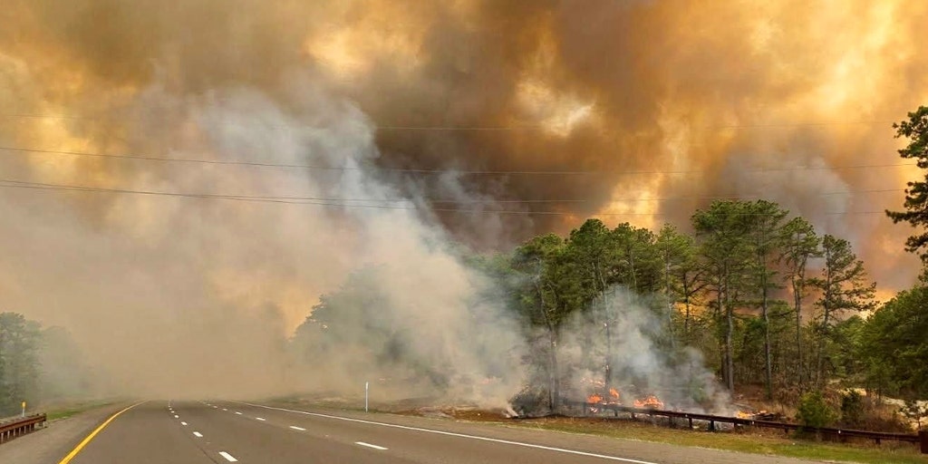 Thousands evacuate as New Jersey wildfire explodes in size, closes part of Garden State Parkway