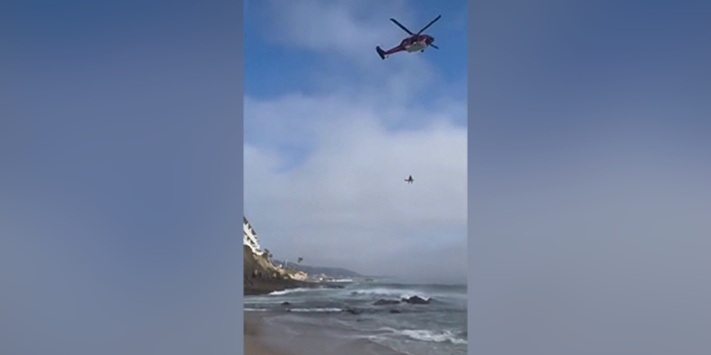 VIDEO: Man hoisted to safety after 20-foot fall from California cliff ...