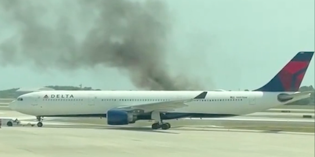 Delta air lines flight catches fire at orlando airport passengers