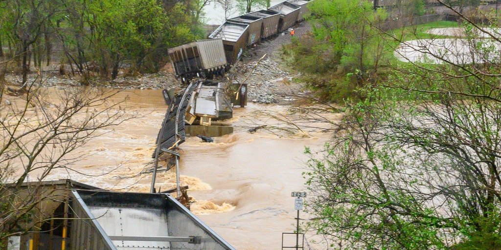 Train derails in Arkansas as swollen river floods bridge in state park
