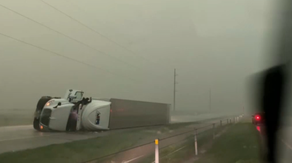 Watch: Fierce winds topple tractor-trailer in Texas amid hurricane-force gusts