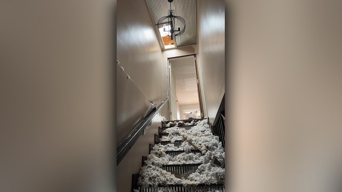 A Missouri couple's home was destroyed by a powerful tornado, but amidst the devastation, pages from their wedding album were discovered over 100 miles away.