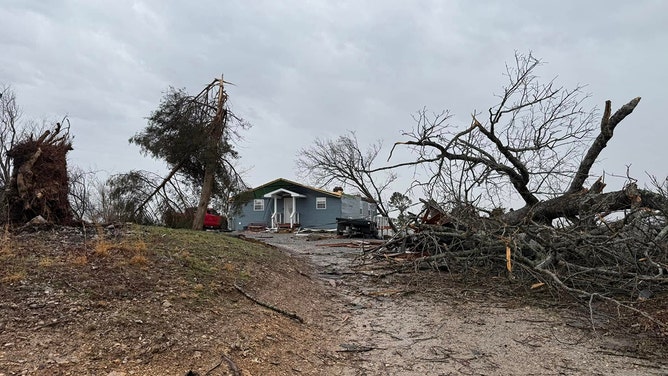 A Missouri couple's home was destroyed by a powerful tornado, but amidst the devastation, pages from their wedding album were discovered over 100 miles away.