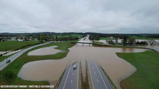 Drone photo shows a flooded Western Kentuck Parkway at the White Mills-Eastview Exit.
