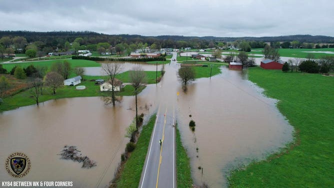 Photo shows a flooded Highway 84 between WK & Four Corners.