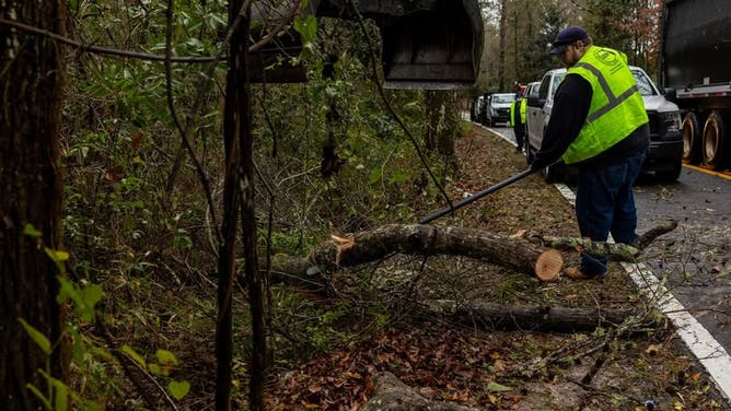 Leon County Public Works clears debris from a road after severe weather on April 7, 2025. 