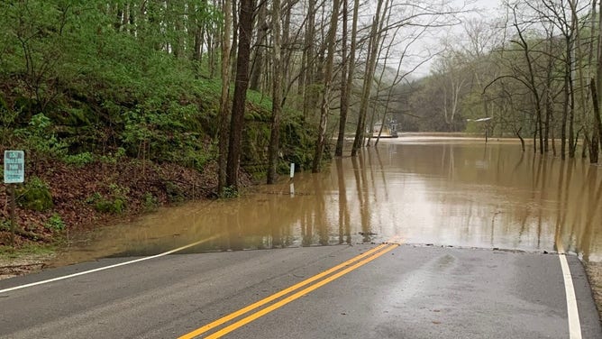 Water covers the parking areas near Green River Ferry on Sunday, April 6, 2025.