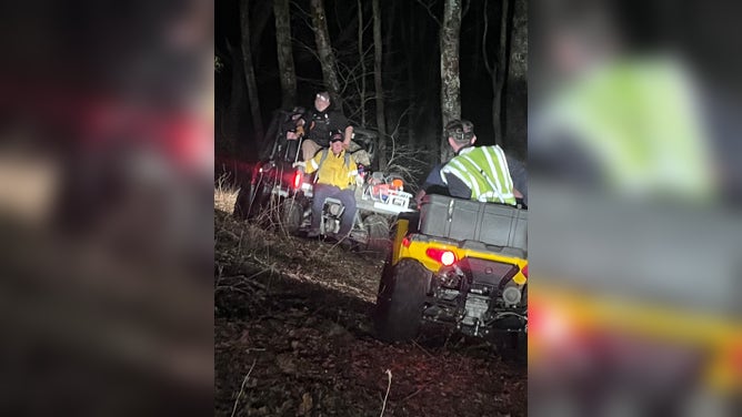Emergency response crews driving through the dark to respond to the campsite.