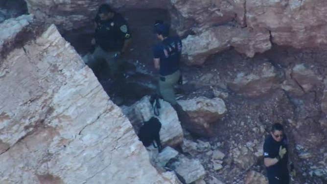 First responders answered the call about two individuals (male and female) who had fallen from the top area to the bottom near the water. 