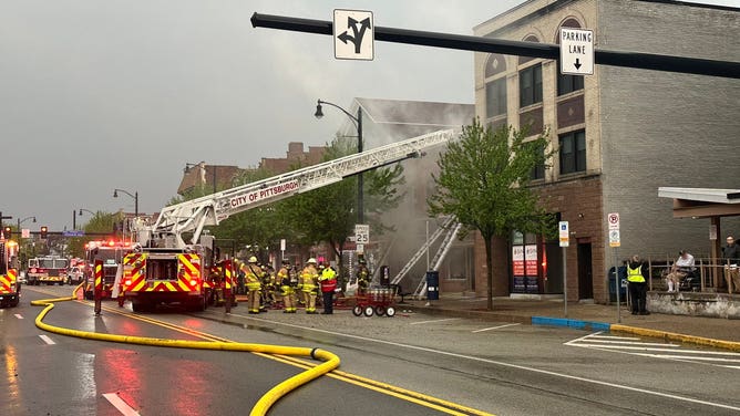 During the severe storms, two firefighters became trapped while fighting a building fire.
