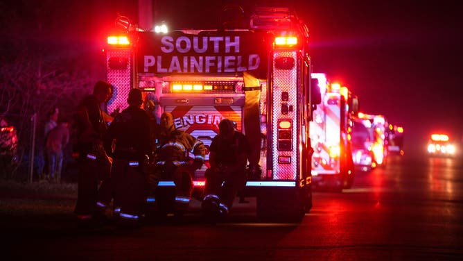 BARNEGAT, NEW JERSEY - APR 23: A wildfire in the Greenwood Forest Wildlife Management Area near Barnegat Township, New Jersey, has burned 8,500 acres and is only 10% contained. The Jones Road Wildfire, which erupted Tuesday, prompted the evacuation of thousands of residents and forced the closure of a major stretch of highway as thick smoke drifted across the Jersey Shore. (Photo by Lokman Vural Elibol/Anadolu via Getty Images)