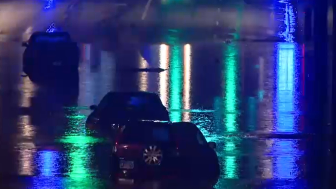 Video shows several vehicles stick in flood waters on Murfreesboro Pike and Lafayette Street in South Nashville.