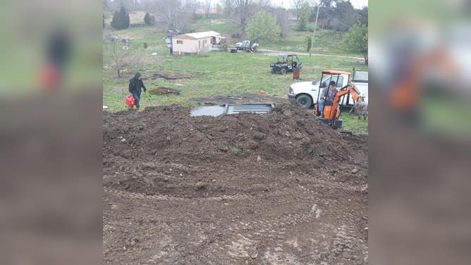 A look at the minivan after it was in the whole and almost completely covered with dirt.