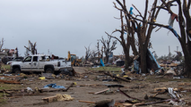 Extensive damage reported after nighttime Kansas tornadoes, train derailment amid rare Tornado Emergency