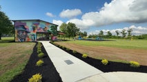 Mayfield takes emotional step toward tornado recovery with opening of historic park