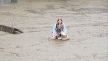 Maryland flash flooding prompts rescue of hundreds of students trapped in school by rising waters