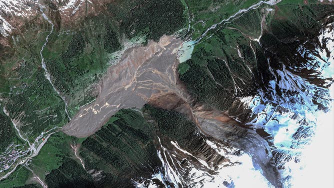 Satellite imagery from over Blatten, Switzerland, showing the aftermath of a large glacier collapse that buried the village under mud and debris on Wednesday.