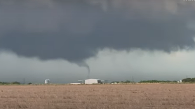 An additional possible tornado is spotted on the right side of a field in Stamford, Texas.