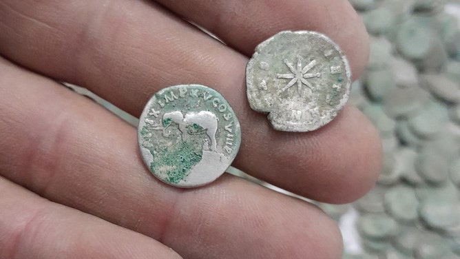 Marius (Bebe) Ionel Mangeac stumbled upon an extraordinary piece of history, unearthing 1,469 Roman coins (silver denarii) on April 19, 2025, near Letca Veche, Romania.