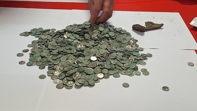 Marius (Bebe) Ionel Mangeac stumbled upon an extraordinary piece of history, unearthing 1,469 Roman coins (silver denarii) on April 19, 2025, near Letca Veche, Romania.