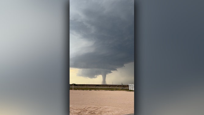 New Mexico newlyweds Daynnely and William Carrillo had an unforgettable start to their marriage when a tornado formed in the background of their wedding photos. Photographer Chesnea Clemmons seized the unique moment, capturing an epic shot.