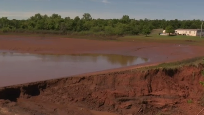 Flooding from severe storms washes out the road leading to Blanchard, OK, effectively cutting the town off from ground travel.