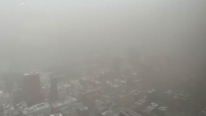 A dust storm moves through Chicago, Illinois, on May 16, 2025.