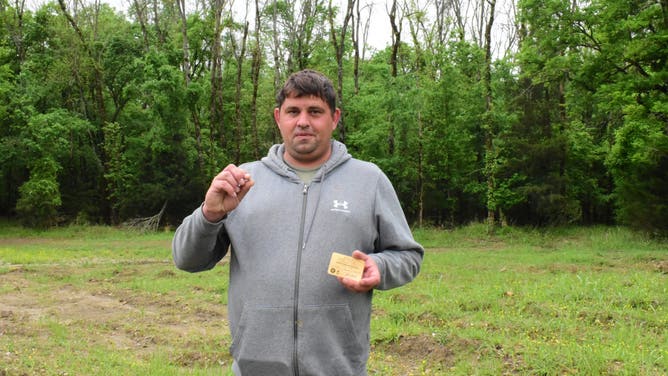 DeCrook holding the Duke Diamond.