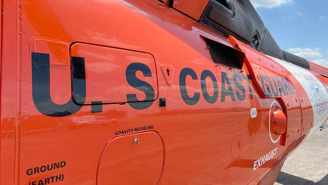 The tail of a Coast Guard helicopter is seen in Houston, Texas, on May 1, 2023.