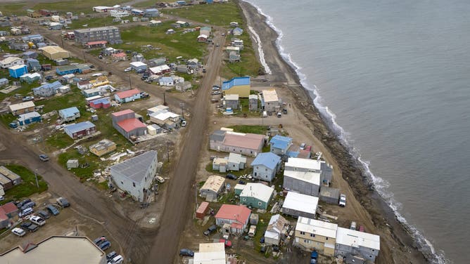 UTQIAGVIK, ALASKA - AUGUST 10: Seen from an aerial view, homes stand along the Arctic Ocean on August 10, 2023 in Utqiagvik, Alaska. Located above the Arctic Circle, Utqiagvik is the northernmost settlement in the United States.