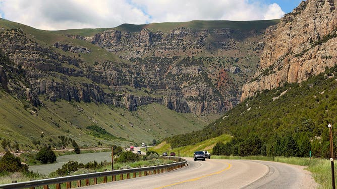 The Wind River and U.S. Highway 20 run through a deep and scenic canyon between the towns of Shoshoni and Thermopolis in central Wyoming