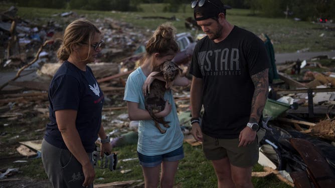  Payson Sexton, 13, is reunited with her canine  aft  it was trapped successful  her grandparent's location   pursuing  the tornado that struck the vicinity  of Sunshine Hills connected  May 17, 2025 successful  London, Kentucky. A tornado struck communities successful  Somerset and London, Kentucky, leaving implicit    10 dormant   and much  injured. (Photo by Michael Swensen/Getty Images)