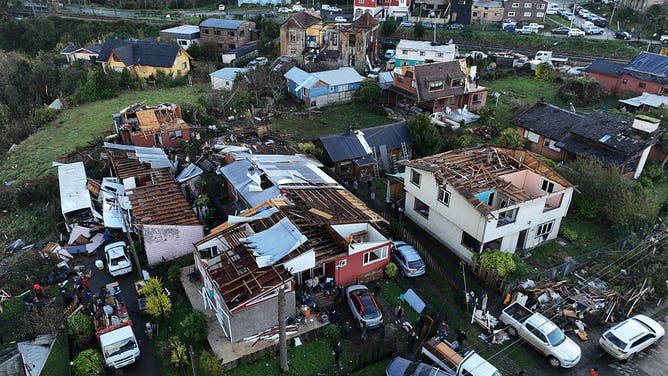 This aerial view shows damages following the passage of a tornado in the city of Puerto Varas, Region de los Lagos, southern Chile, on May 26, 2025.
